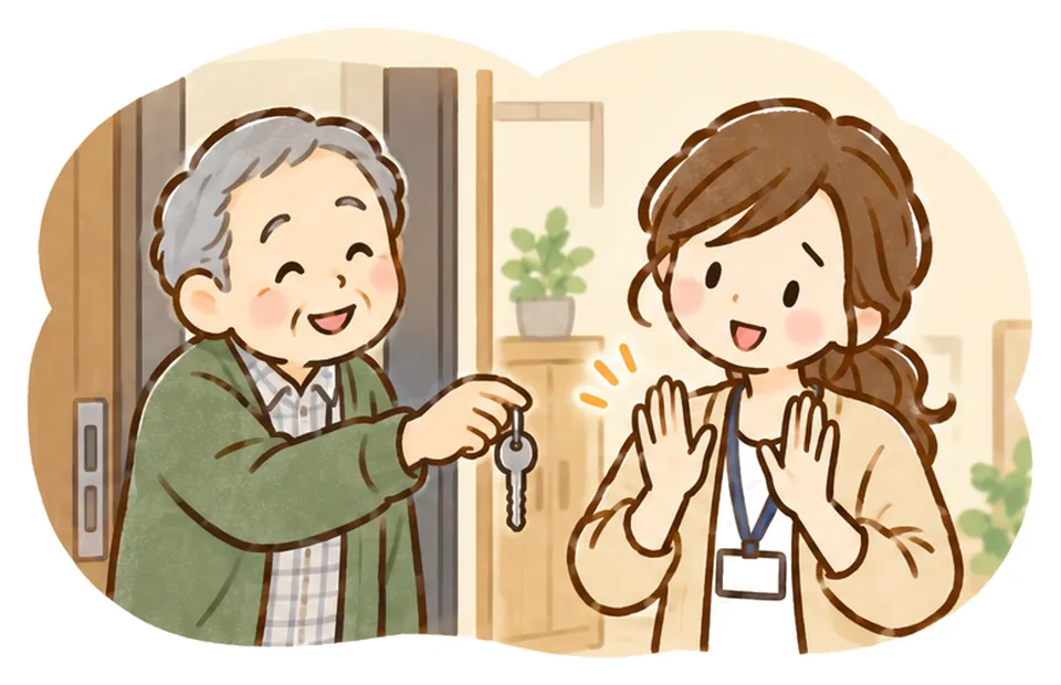 玄関でおじいさんが合鍵を差し出し、ケアマネが手を小さく振っている
