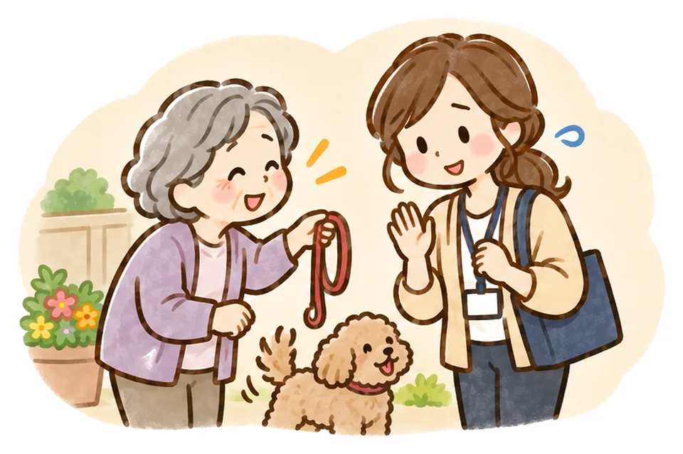 おばあさんが犬のリードを差し出し、ケアマネが困った笑顔をしている